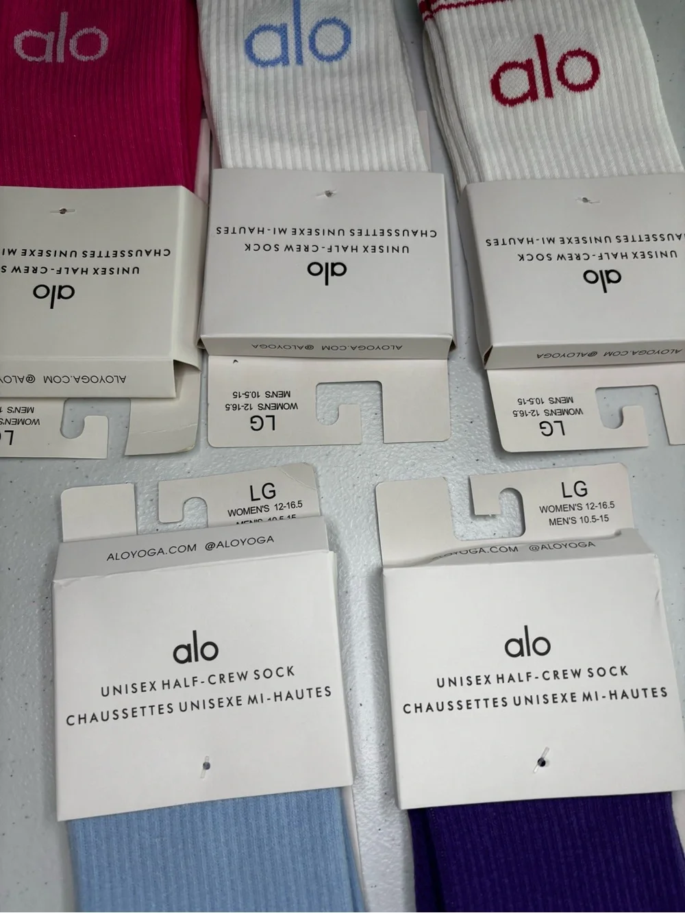 ALO Yoga Five Pack Half-Crew Socks in Purple, White, Light Blue, Pink,and Maroon